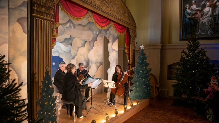 Aurora Strings perform on the Baroque theatre stage in the West Wing at Seaton Delaval Hall Northumberland